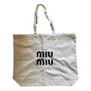 Large shopping bag in MIUMIU canvas, never used